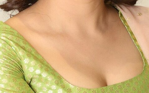 Nandini Rai busty boobs low neck white cleavage photoshoot